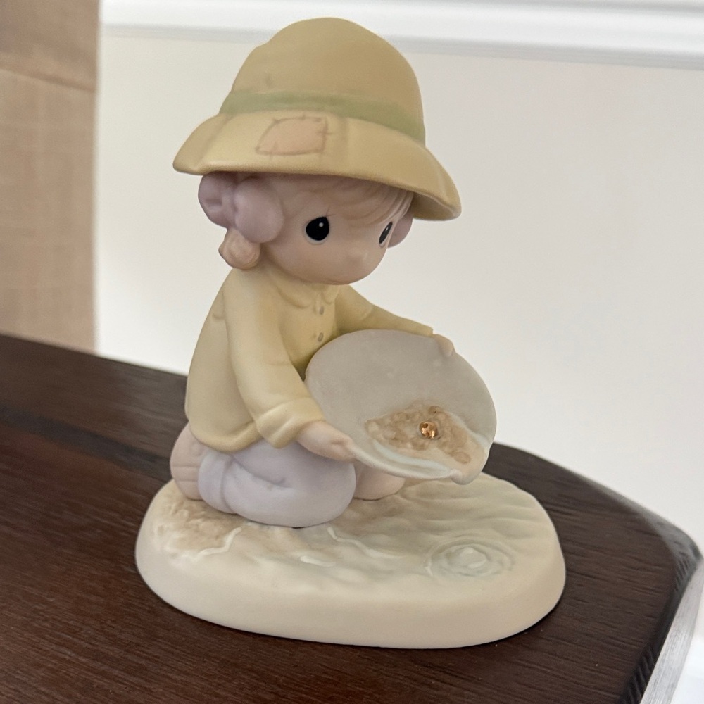 Precious Moments Yellow and Cream Girl Panning Figurine